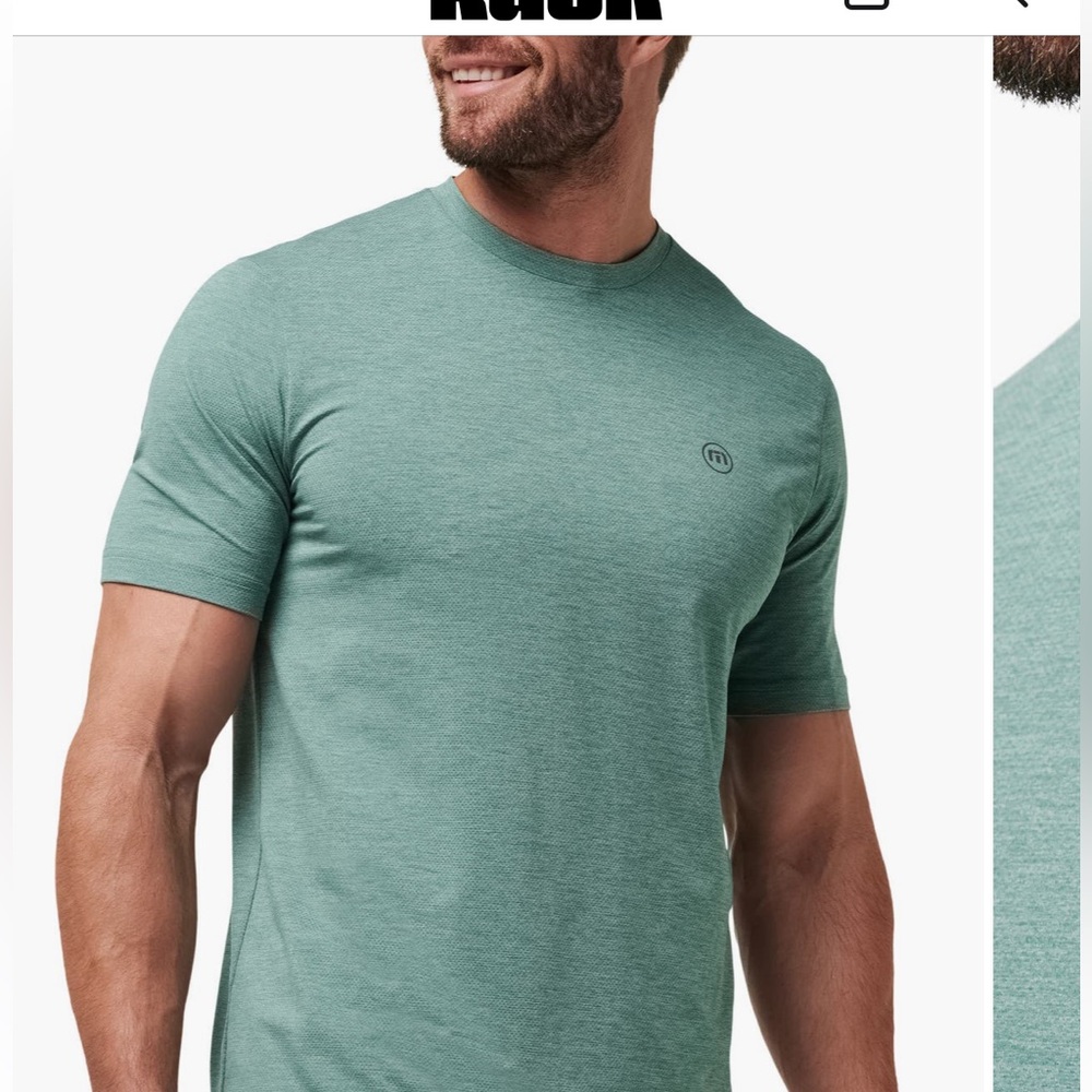 Travis Mathew Scenic Vista Logo T shirt. Heather Silver pine color